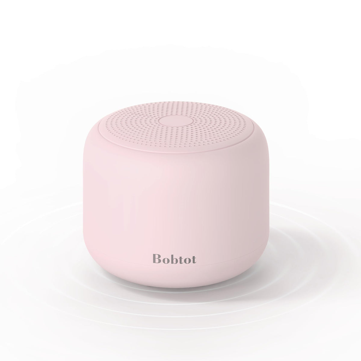 Bobtot portable Bluetooth speaker with pink strap for easy carrying on outdoor adventures.