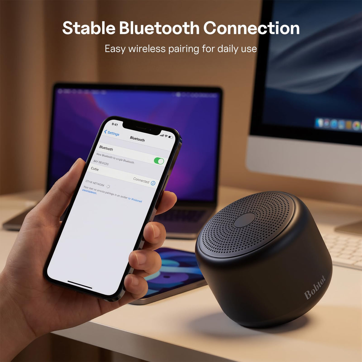 Bobtot speaker showing 1200mAh battery and long playtime capability