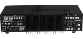 Bogen 100 WATT Amplifier on a desk setup delivering versatile home studio sound.