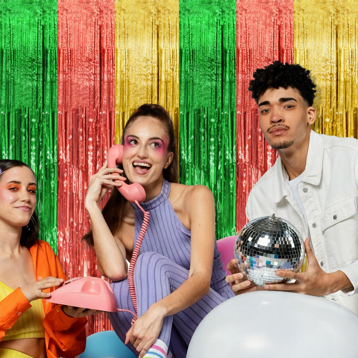 BOMSI tinsel curtain in photo booth creating a vivid party backdrop