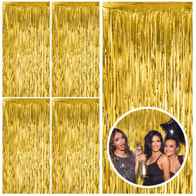 BOMSI gold fringe curtain backdrop in doorway creates striking entry and photo backdrop