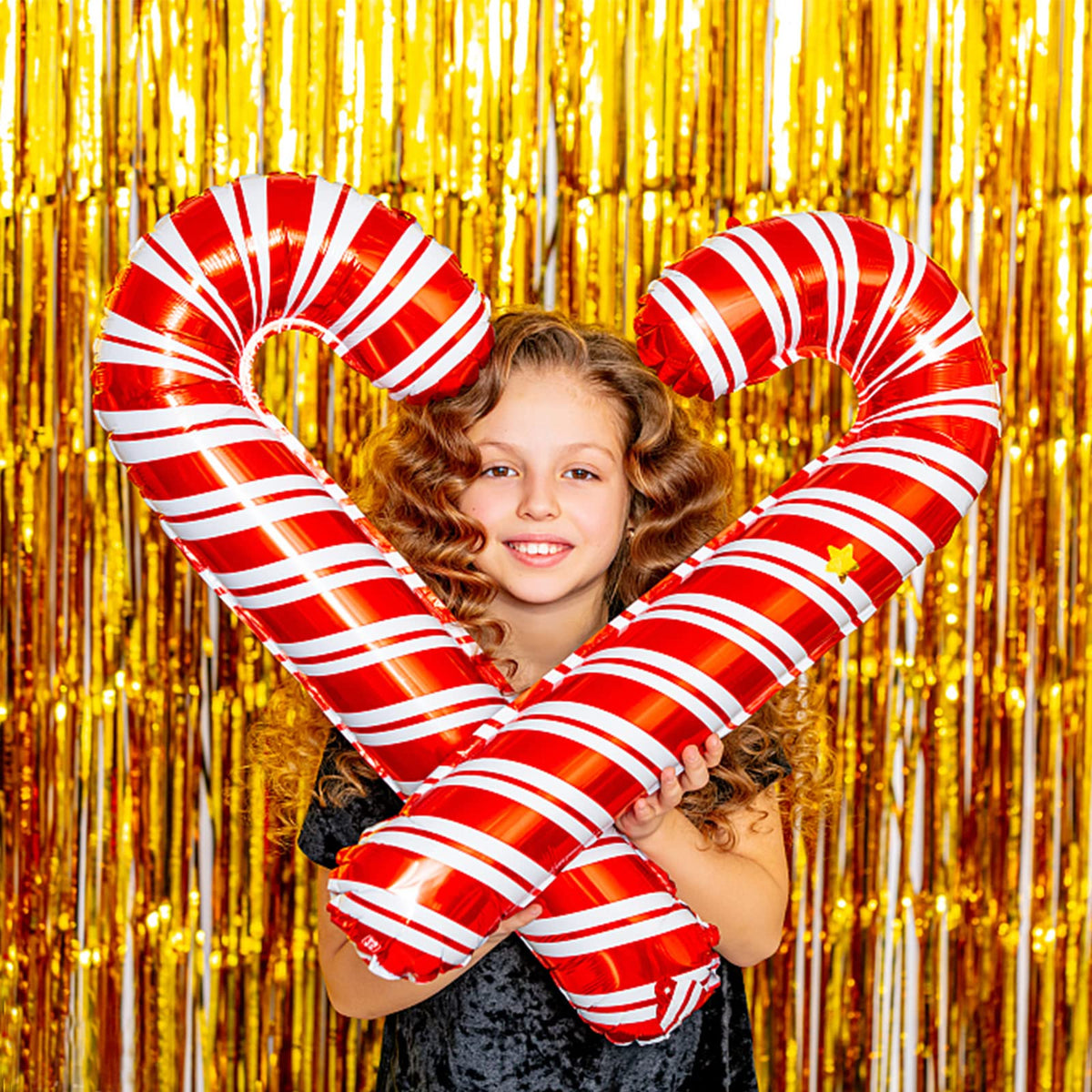 BOMSI gold fringe used as photo booth backdrop improving pictures and lighting
