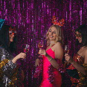 BOMSI backdrop styled with balloons demonstrating coordinated party decor