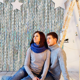 Bomsi reusable fringe backdrop sticks easily for quick setup and reuse.