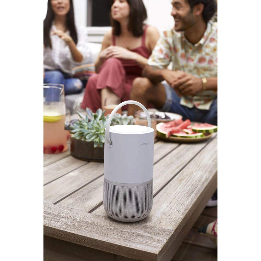 Bose Portable Smart Speaker in silver, in-home setup, versatile multi-room audio throughout the house