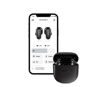 Bose QuietComfort Earbuds II charging case in pocket showing compact carry advantage