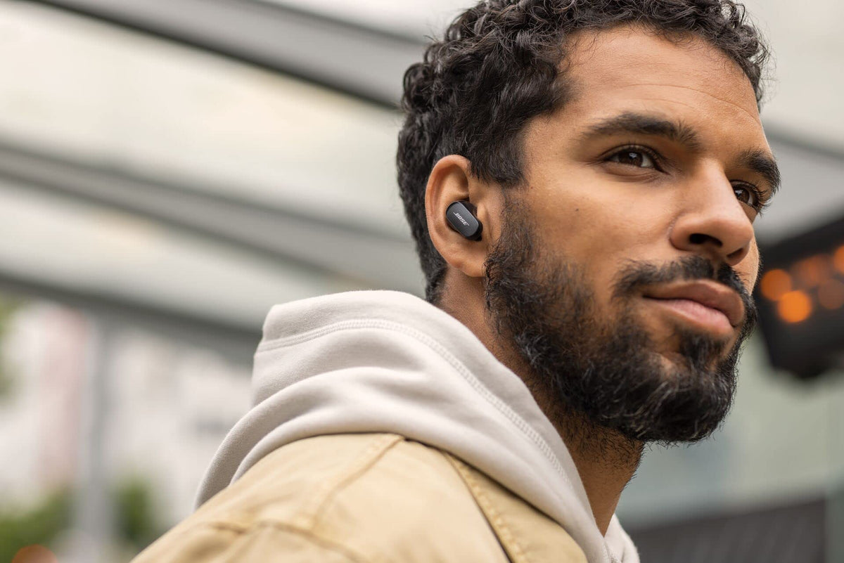 Bose QuietComfort Earbuds II side profile in triple black emphasizing refined appearance