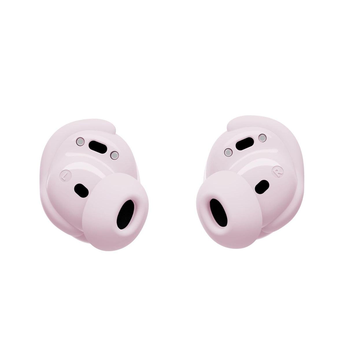 Bose QuietComfort Earbuds Petal Pink worn for comfortable listening.