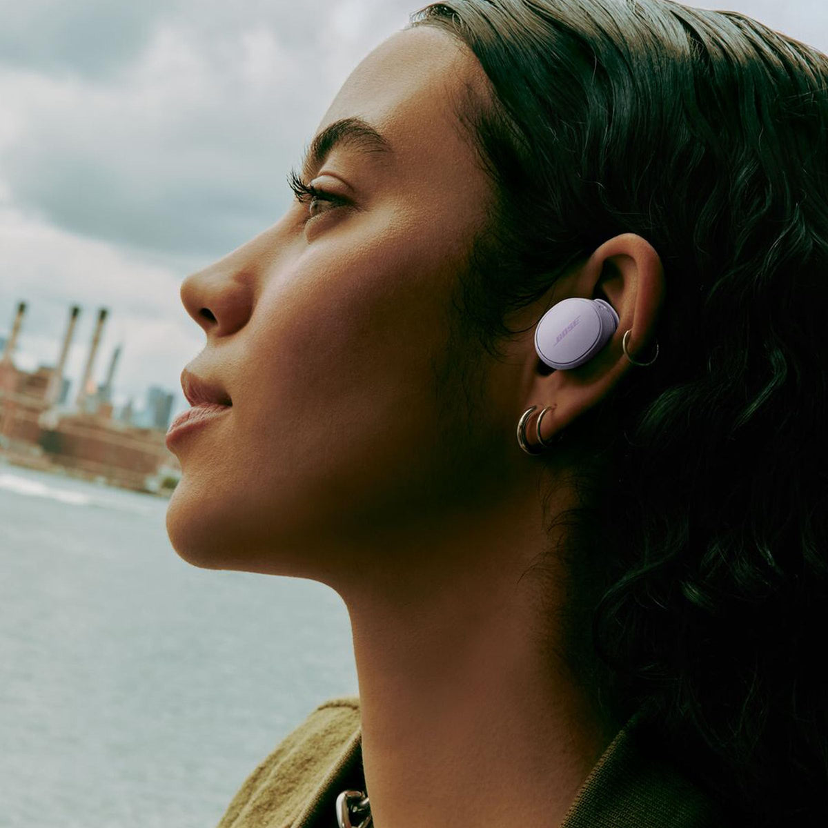 Bose QuietComfort earbuds worn in ear for everyday listening and calls