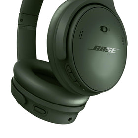 Bose QuietComfort Cypress Green headphones in case, highlighting travel-friendly storage.
