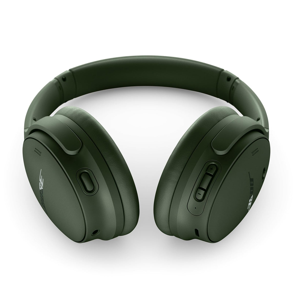 Bose QuietComfort Cypress Green worn by a model, demonstrating secure over-ear fit.