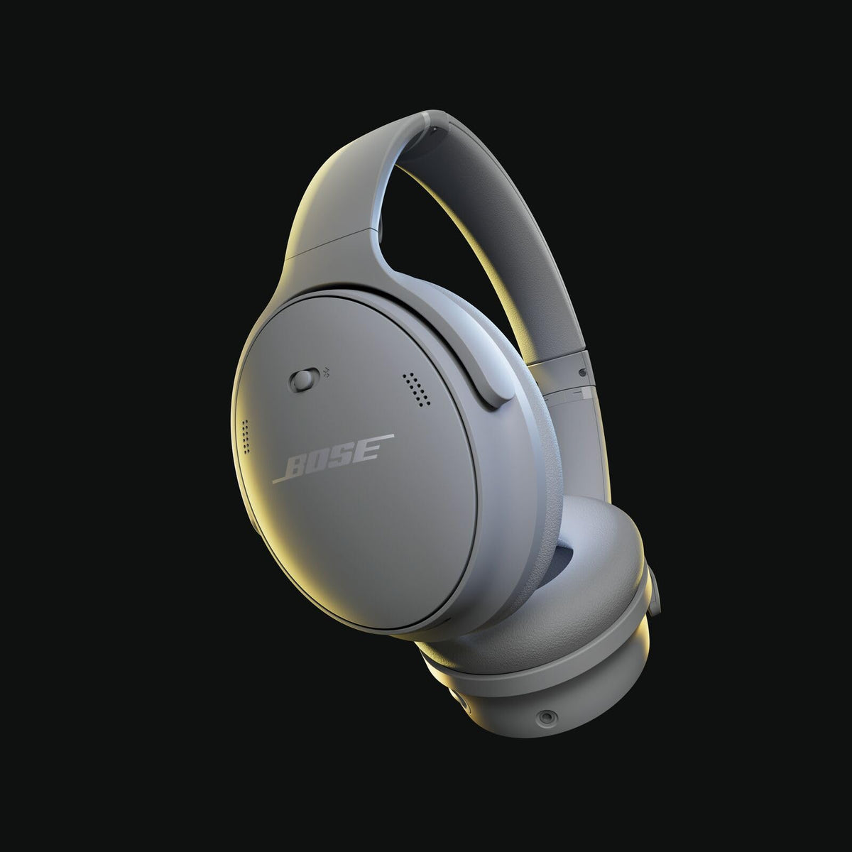 Bose QuietComfort headphones demonstrating active noise cancellation for focused listening.