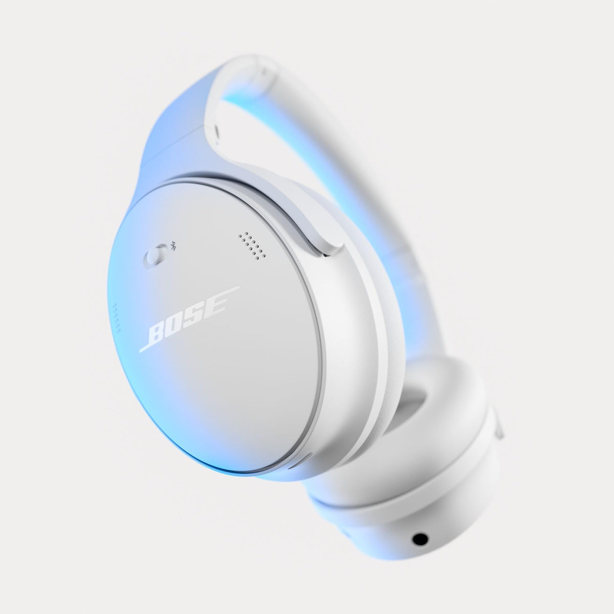 Bose QuietComfort headphones side profile with soft cushions and headband.