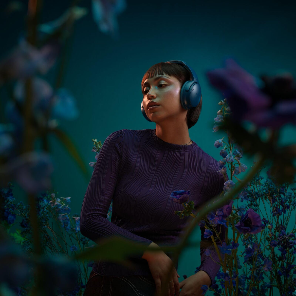 Bose QuietComfort Twilight Blue headphones with active noise cancellation for focused listening.