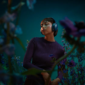 Bose QuietComfort Twilight Blue headphones with active noise cancellation for focused listening.