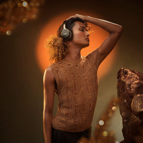 Bose QuietComfort Ultra Desert Gold headband detail with premium metal