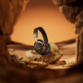 Bose QuietComfort Ultra Desert Gold cinema-mode scene for immersive viewing