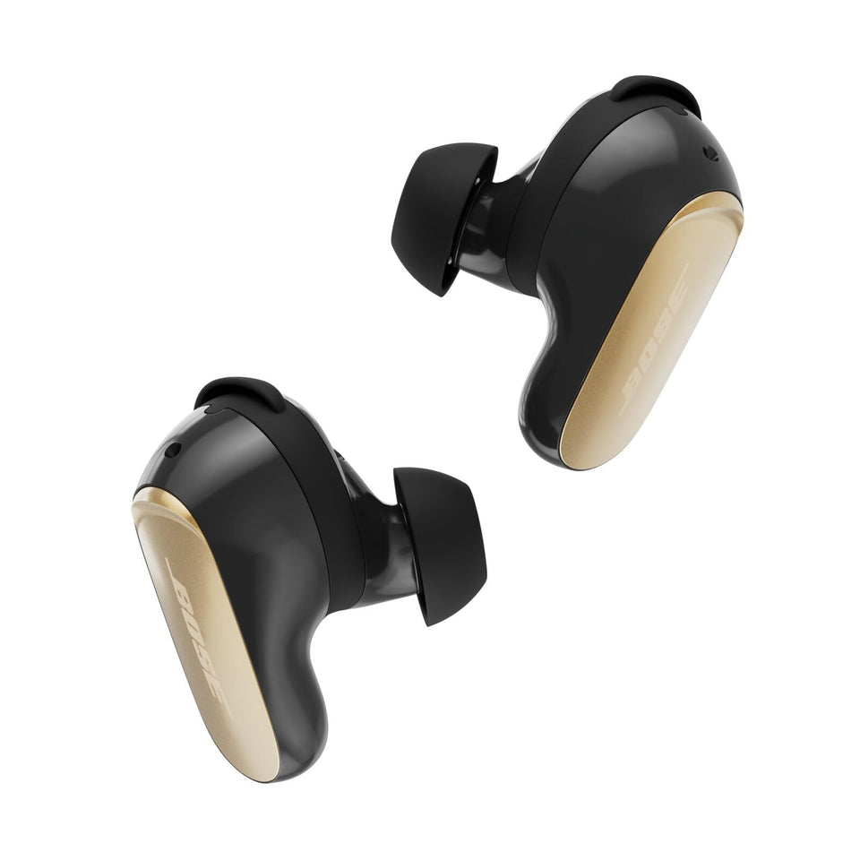 Bose QuietComfort Ultra Earbuds Desert Gold case ready for travel with secure charging.