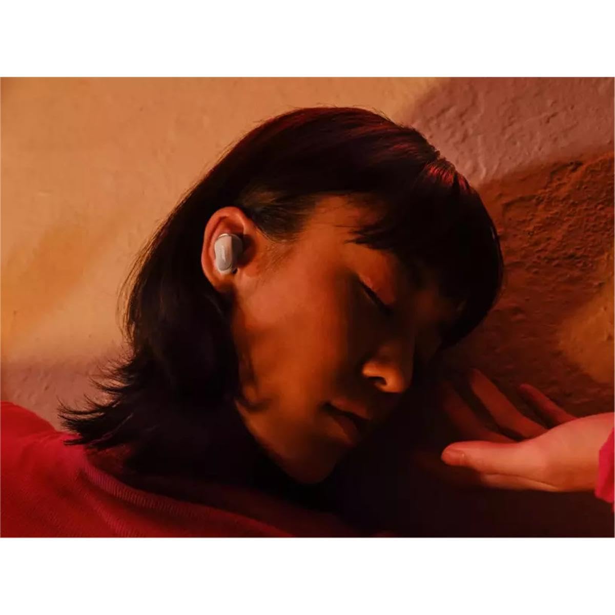 Bose QuietComfort Ultra Earbuds showcasing adjustable noise cancellation for focused listening in busy environments.
