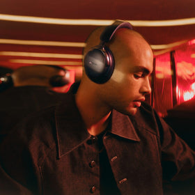 Bose QuietComfort Ultra Headphones metal arms detail for durable daily wear.