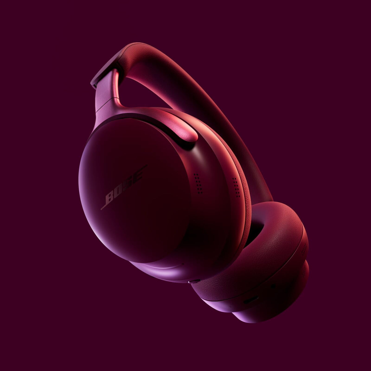 Bose QuietComfort Ultra headphones in a quiet setting with noise cancellation.