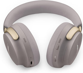 Bose QuietComfort Ultra Sandstone headphones worn for all-day comfort and calls