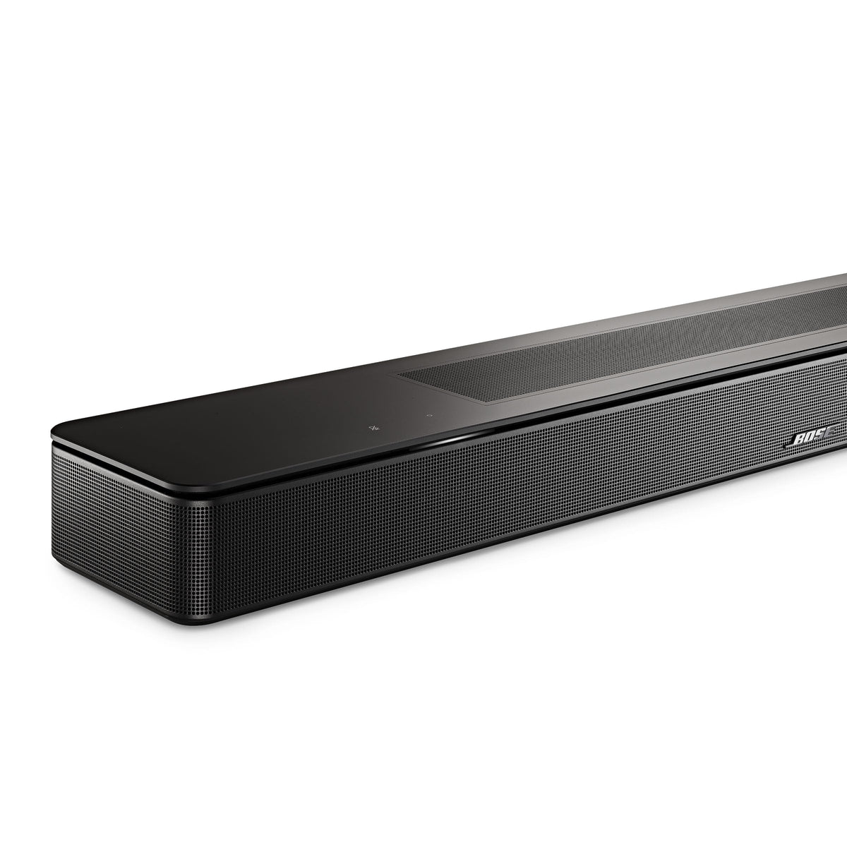 Soundbar placed beside a TV in a home entertainment setup for theater-like sound