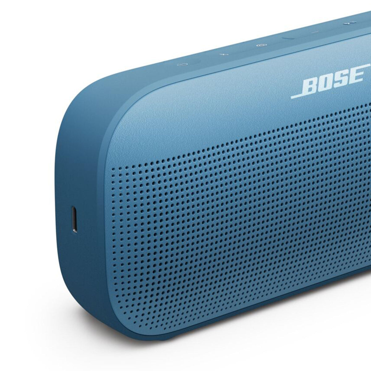 Bose SoundLink Flex 2nd Gen clipped to backpack for hands-free music