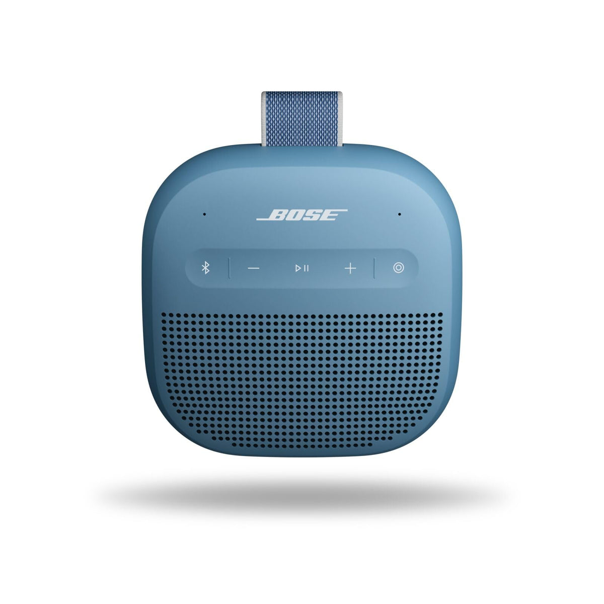 Bose SoundLink Micro in hand, showcasing ultra-portable palm-sized design for on-the-go listening