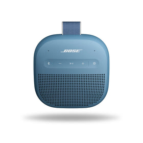 Bose SoundLink Micro in hand, showcasing ultra-portable palm-sized design for on-the-go listening