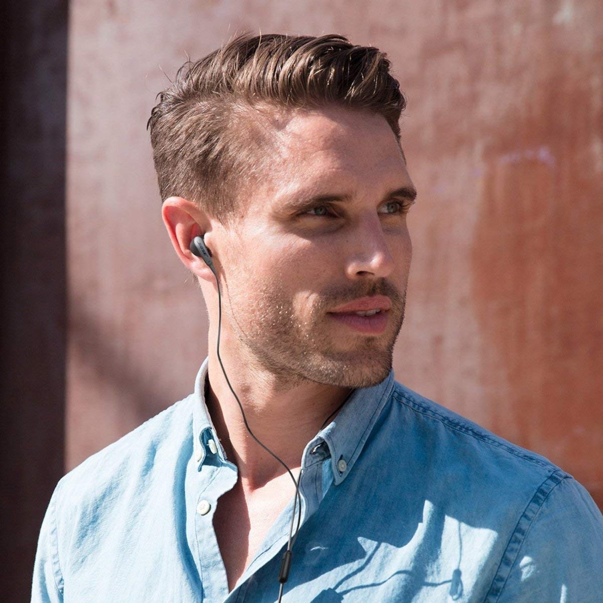 Clothing clip included with Bose SoundSport helps secure the cord during activities.