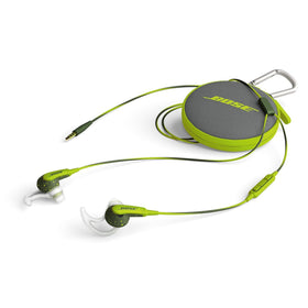Bose earbuds worn by runner in Energy Green, staying secure during exercise