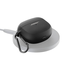 Bose Ultra case with carabiner clipped to backpack for secure on-the-go carry
