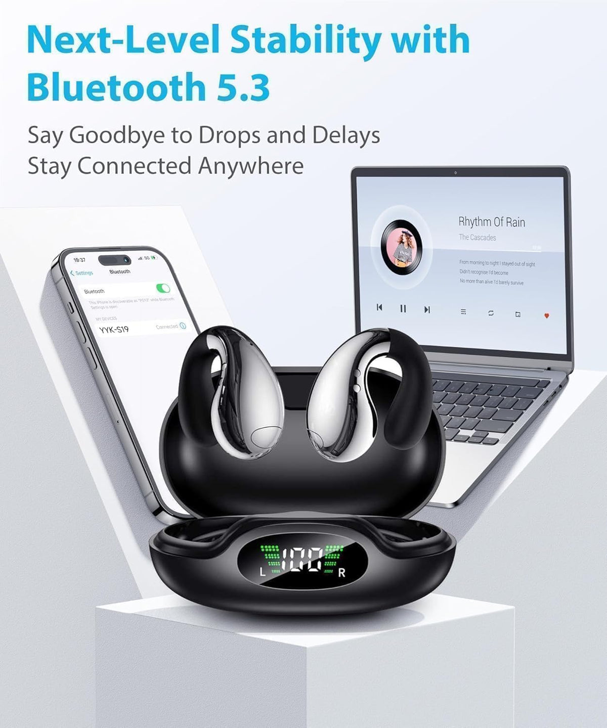 Boytond earbuds next to smartphone showing compact size and portability