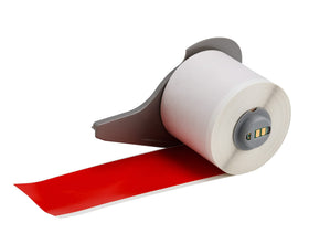 Brady all-weather label tape in red on a roll for durable outdoor labeling.