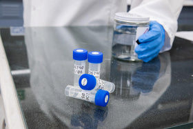 Brady B-499 label wrapped on cable demonstrating conformability and lasting adhesion benefit