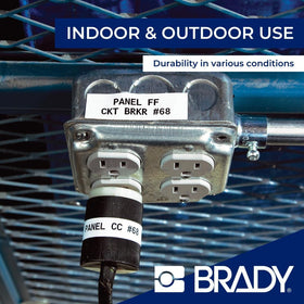 brady label applied to outdoor pipe showing weather resistance benefit