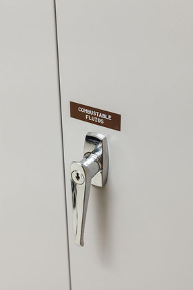 Brady vinyl label applied to curved pipe showcasing strong adhesion benefit
