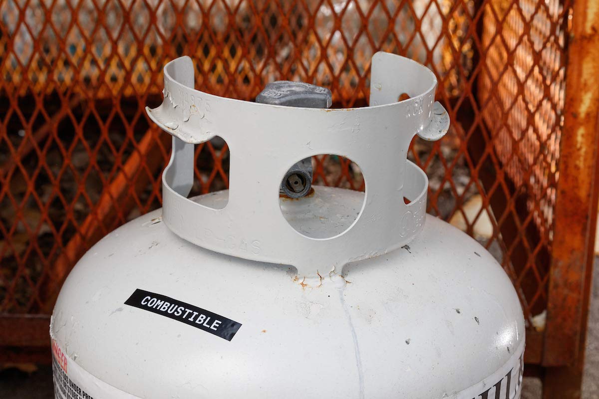 Brady label next to ruler showing 0.375-inch width for sized applications