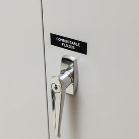 Brady printed white-on-black label applied to industrial equipment for clear ID