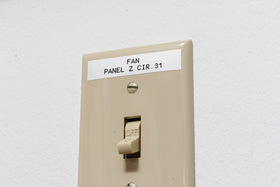 Brady label applied to industrial pipe demonstrating strong adhesion benefit