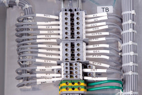 Brady printed label on stainless panel showing durable adhesion and legibility