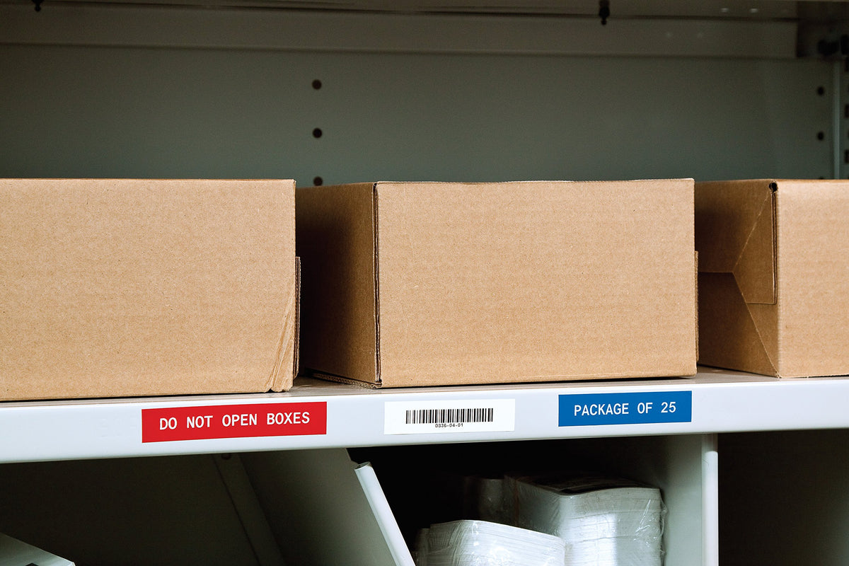 Label roll beside ruler showing .75 inch width and 21 foot length clarity