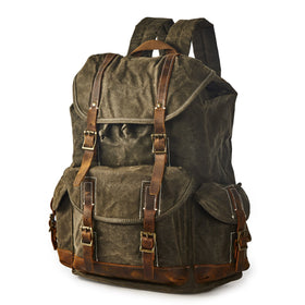 BRASS TACKS Leathercraft backpack front view shows rugged waxed canvas and vintage leather trim for daily use.