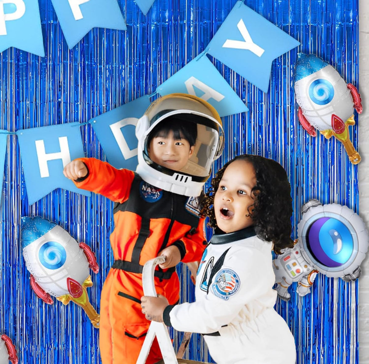BRAVESHINE blue tinsel curtain paired with balloon arch creating a festive scene