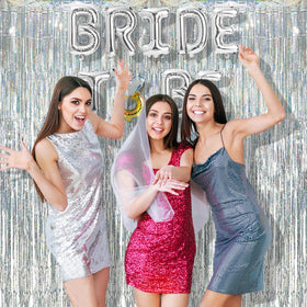 BRAVESHINE foil fringe curtain for birthday adds shimmering ambiance.