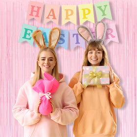 BRAVESHINE full hanging display creating a soft pink photo booth background