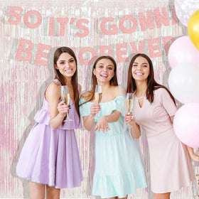 BRAVESHINE holographic tinsel curtain backdrop creates party-ready ambience for selfies.