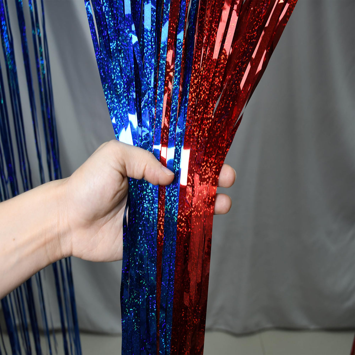 BRAVESHINE foil fringe curtain ideal for 4th of July celebrations.