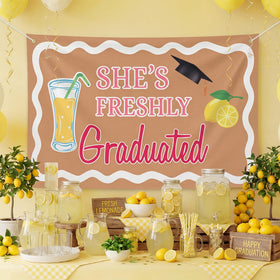Breling graduation backdrop rolled up for easy storage after the celebration.